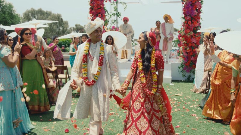 Indian wedding couple enjoying their ceremony