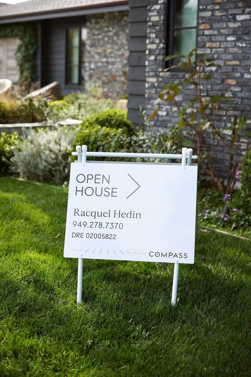 Racquel Hedin real estate agent open house sign outdoors