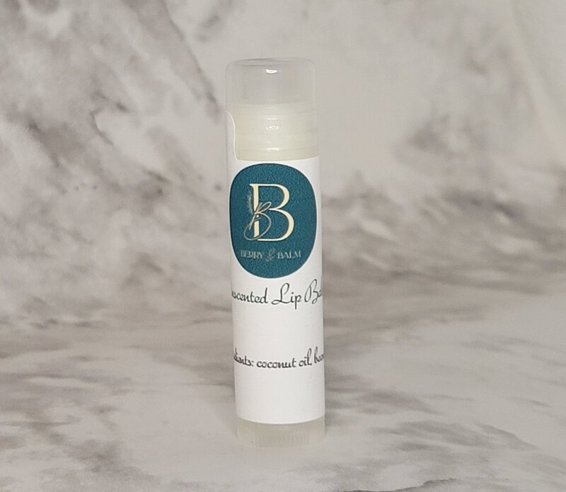 Tube of original lip balm displayed to show Berry and Balm simple ingredients