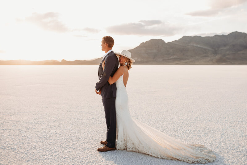 Gorgeous wedding photo of Colorado Couple  in the Salt Flats in Bonneville, Utah.  Sweet Justice are traveling photographers.