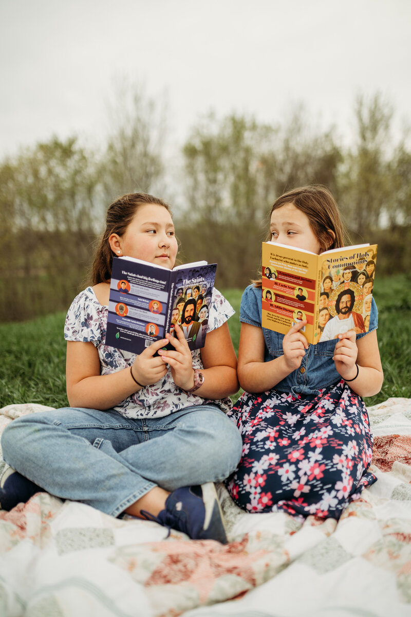 girls sitting in year reading books