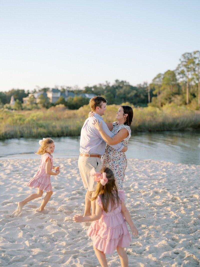 Family photography session at East Beach in Ocean Springs, Mississippi.