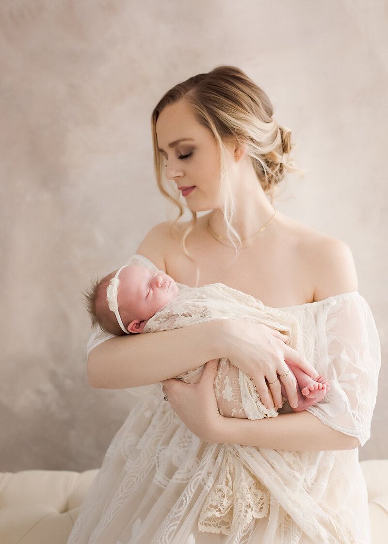 Mom and Baby Girl at Newborn Photography studio