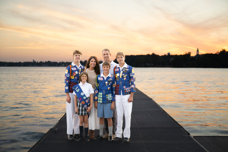 Culver Family Portrait with campers and parents at Culver Woodcraft Camp with Lake Maxinkuckee in the background located in Culver, Indiana by Always Images. 