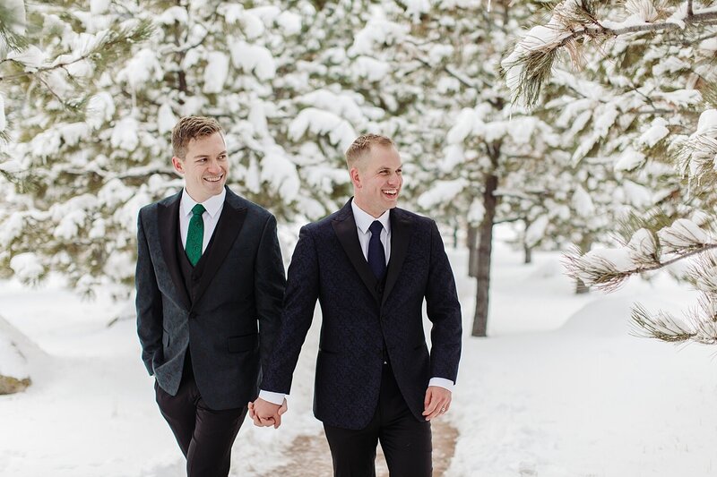 Colorado wedding couple at the base of a mountain