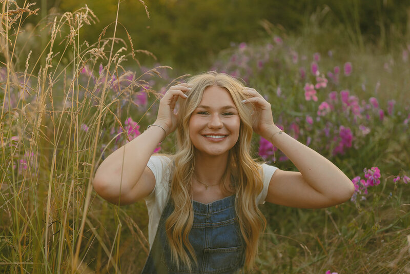 teenage girl walking in grass in newberg, oregon