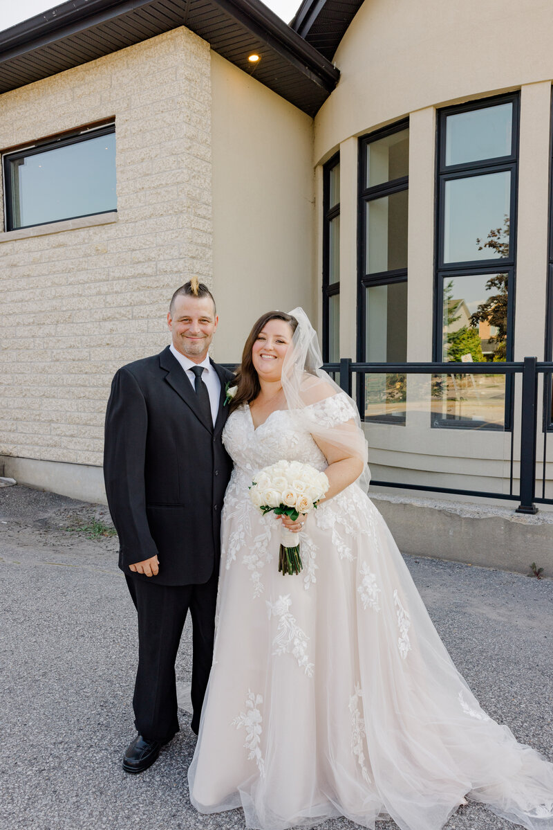 ottawa wedding venues - couple at the NAC just married at the NAC in Ottawa