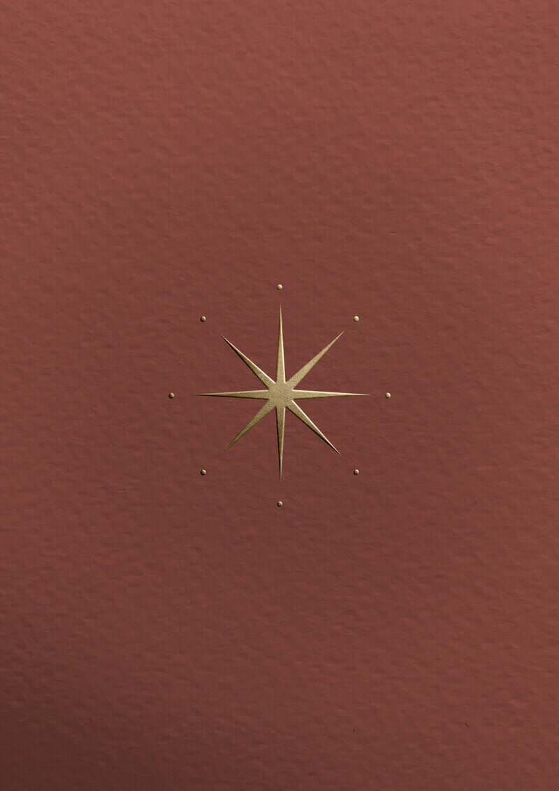 A striking gold star set against a bold red background, representing success and guidance in therapeutic journeys.