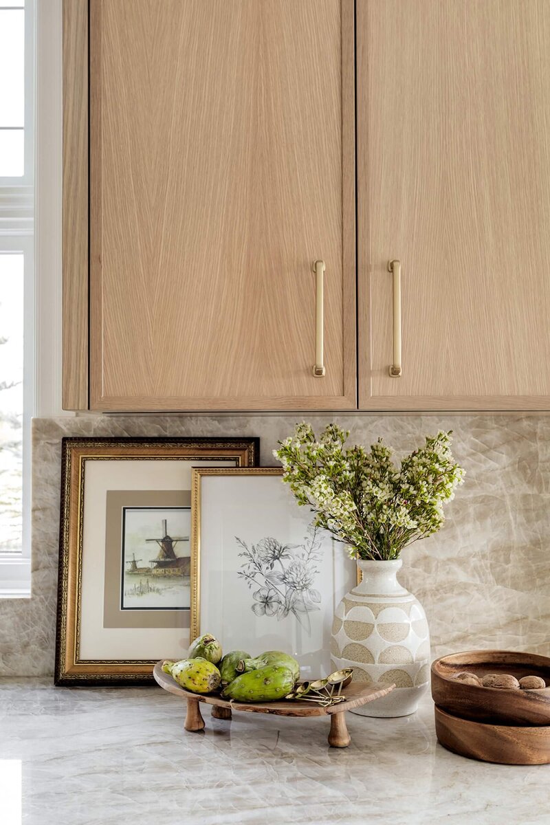 Kitchen renovation with quartzite and skinny shake white oak cabinets. 