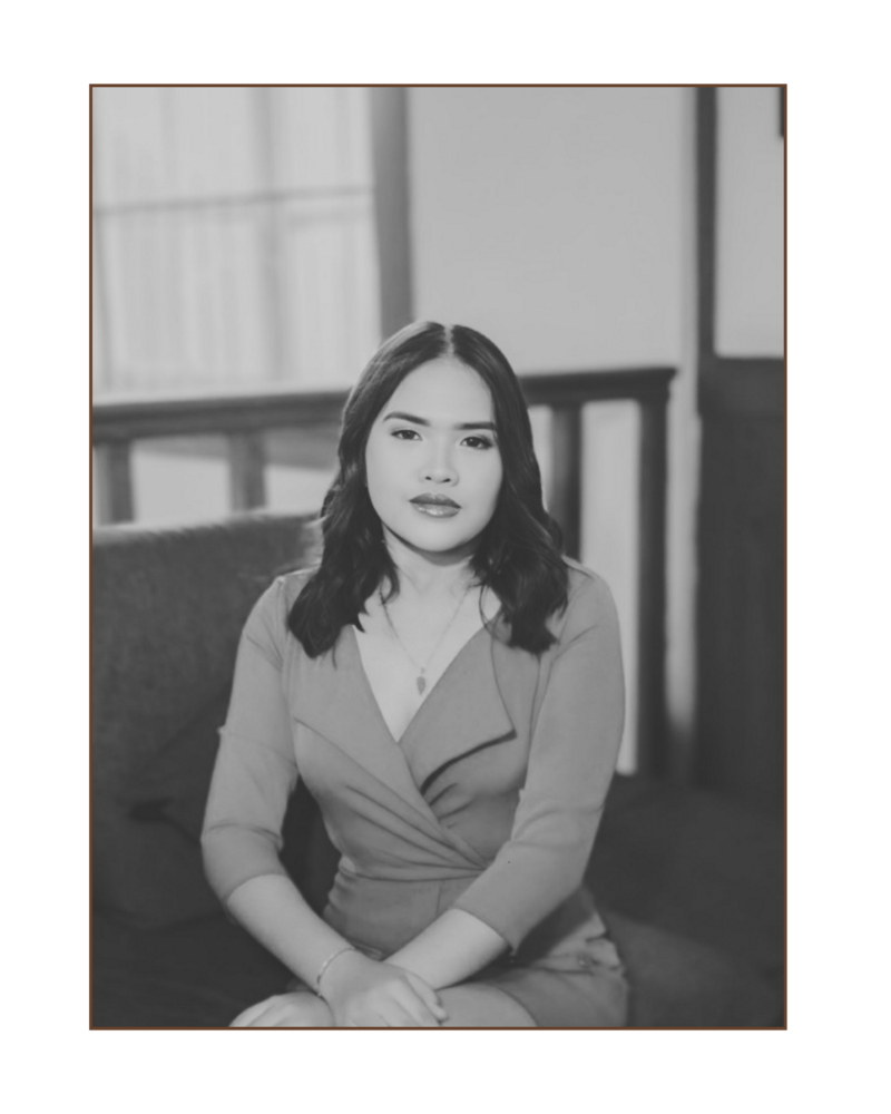 Portrait of a confident businesswoman representing a web design agency specializing in holistic branding and custom websites for lifestyle brands.