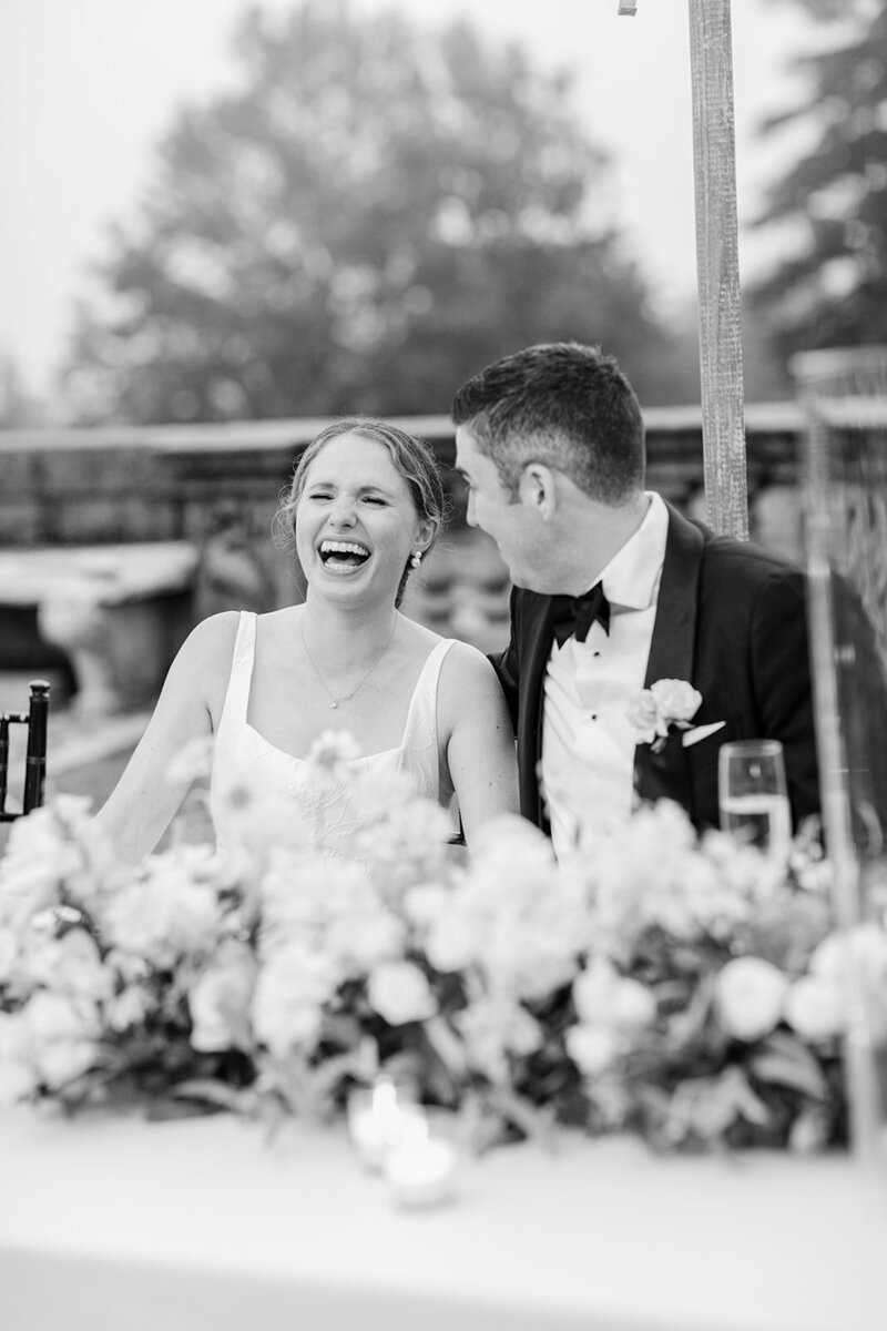 bride-laughing-tented-reception