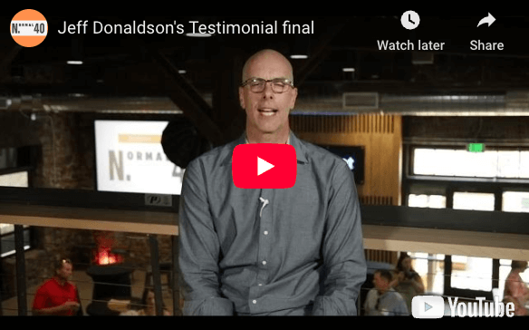Jeff Donaldson sharing his Vintage One testimonial on video during a Normal 40 in-person mastermind event