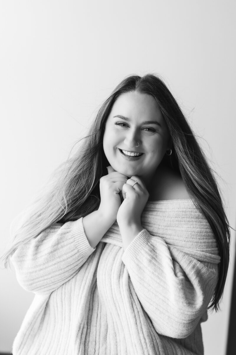 Girl smiling at a photoshoot in Horsham