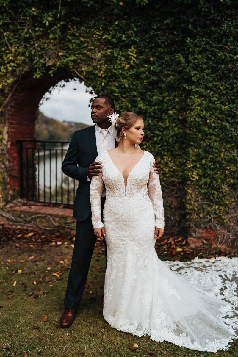 Bride with husband with rock on hand sign
