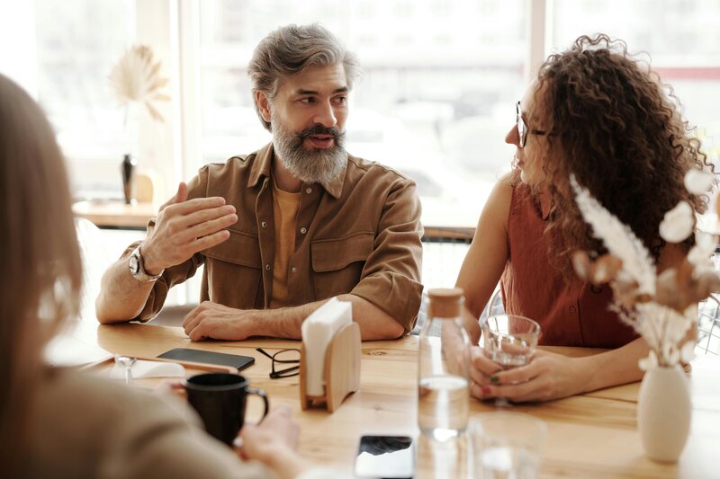 women metting at table