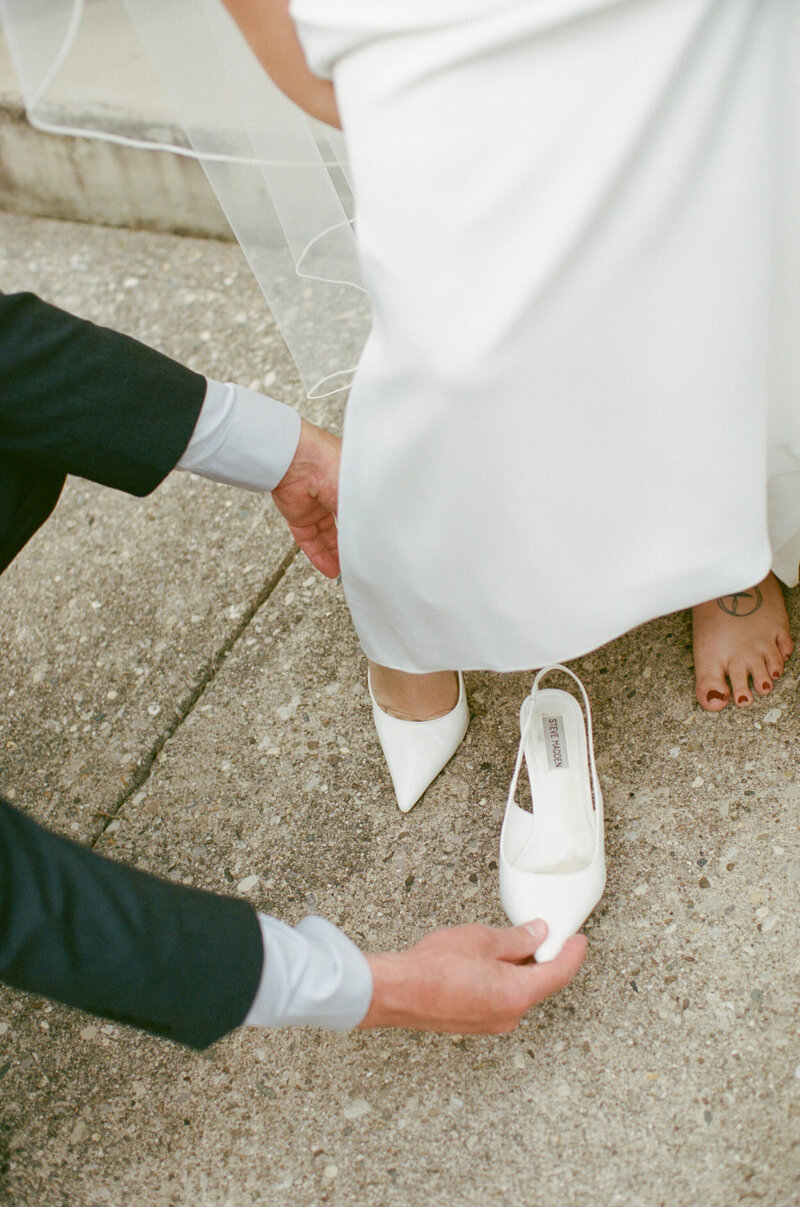 Couple laughing naturally during outdoor wedding vows in Cincinnati