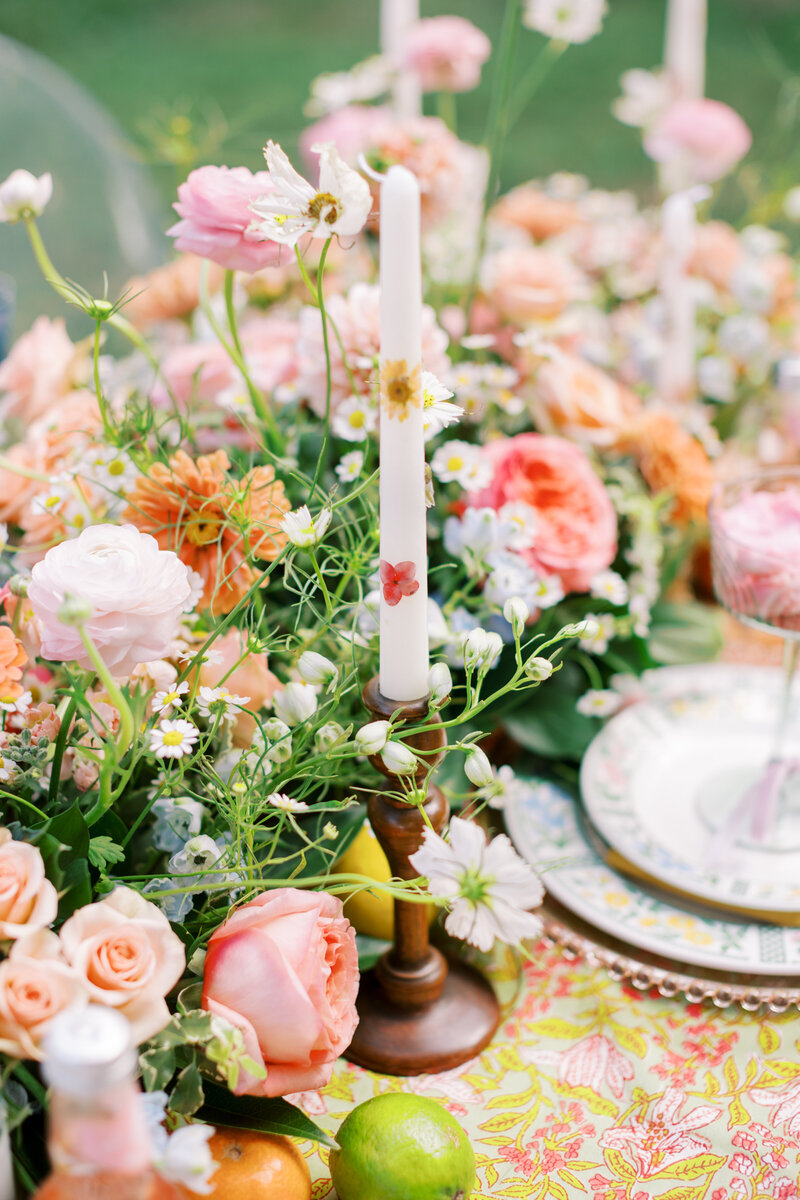 Colorful floral table arrangement for wedding reception in Alabama
