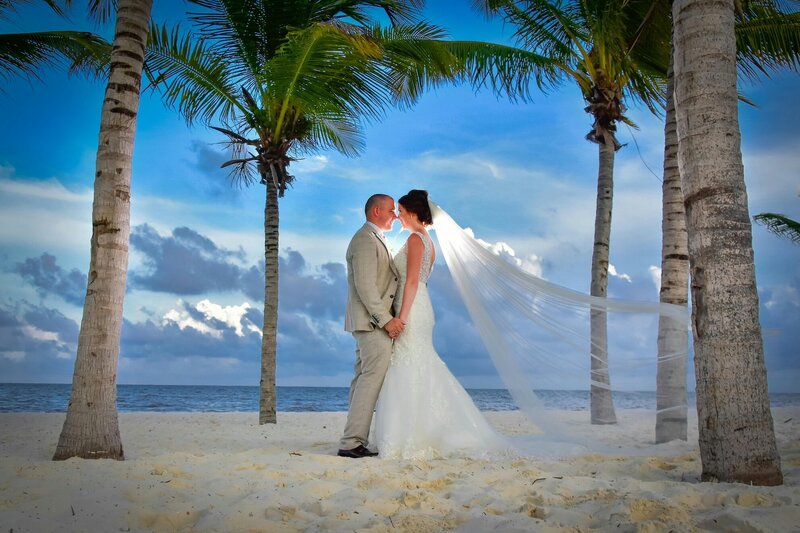 Hawai’i beach elopement at golden hour with tropical bouquet