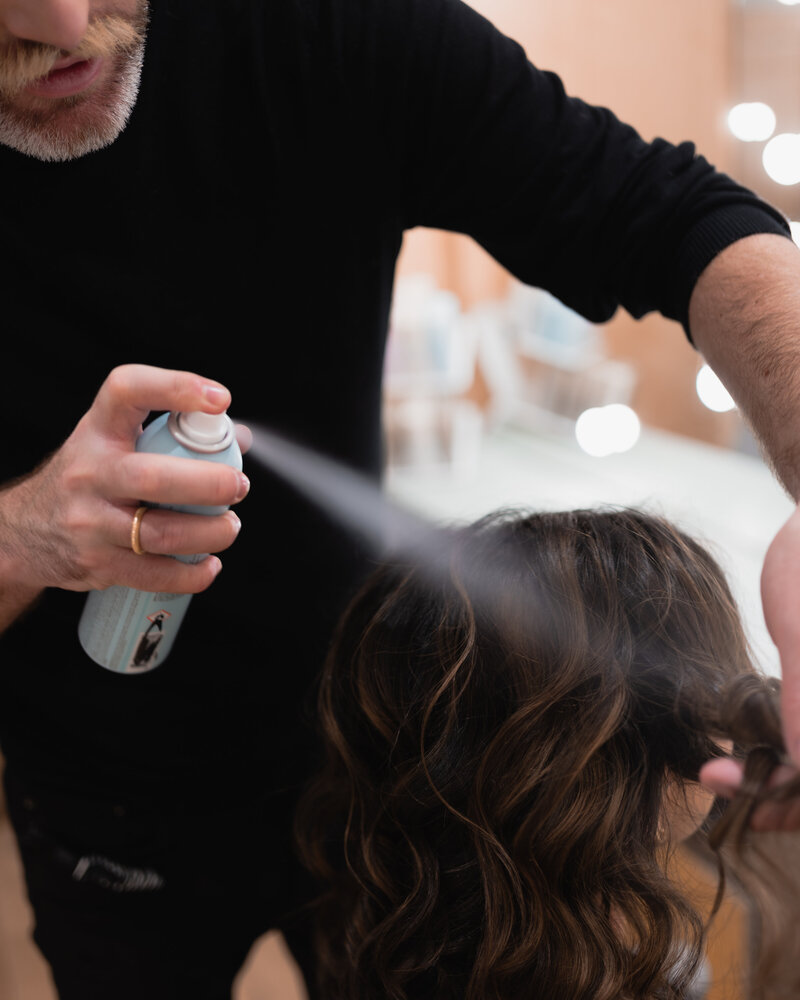 photo of woman at dublin hair salon getting hairspray in her hair