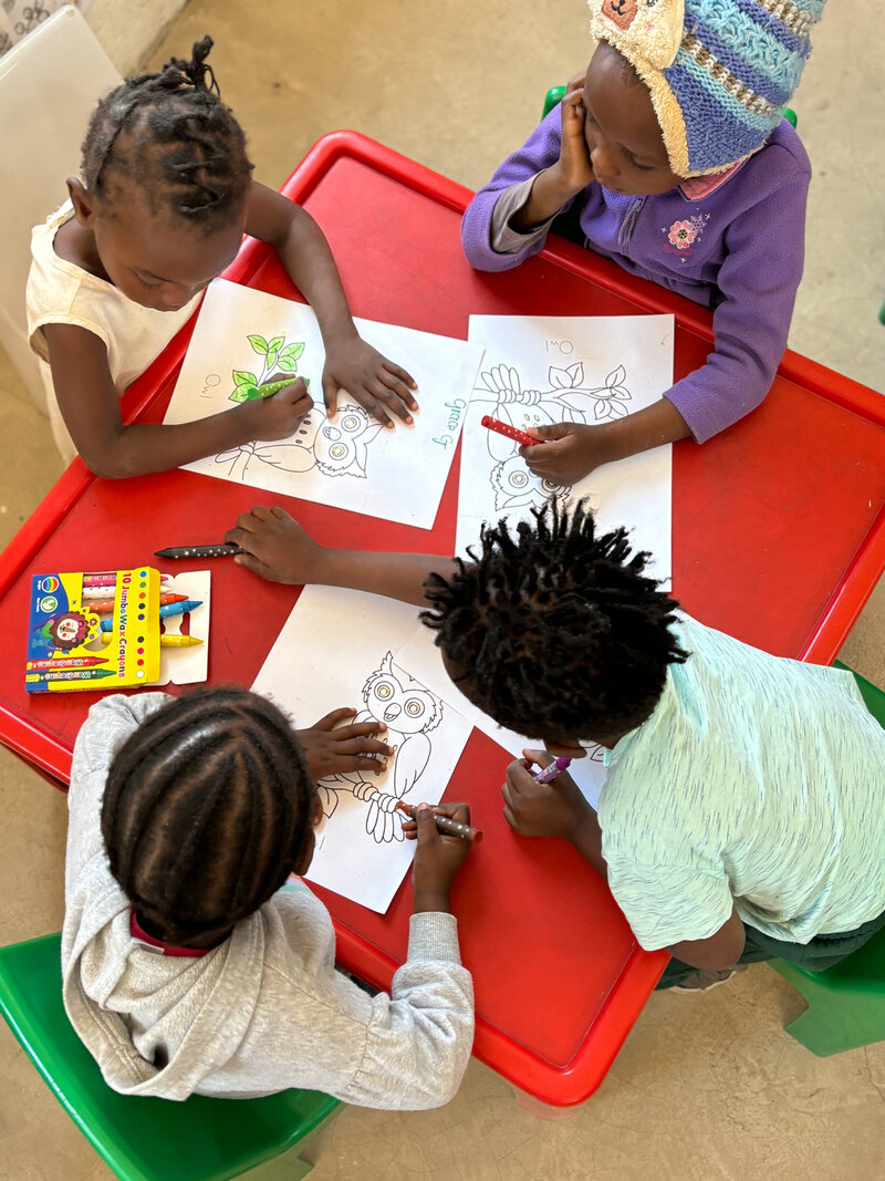 Kids at Rise with new crayon donations