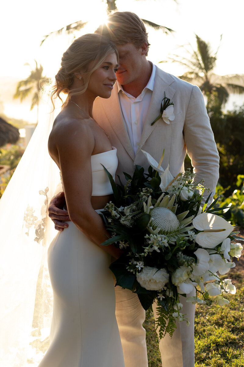 Bride and groom at wedding in sayulita mexico during sunset