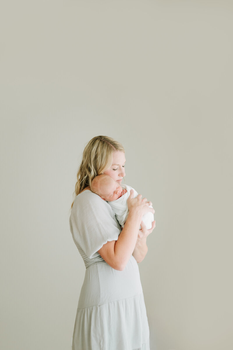 Redding California portrait studio, mother and new baby, in light and airy studio, Cayton Heath Photography