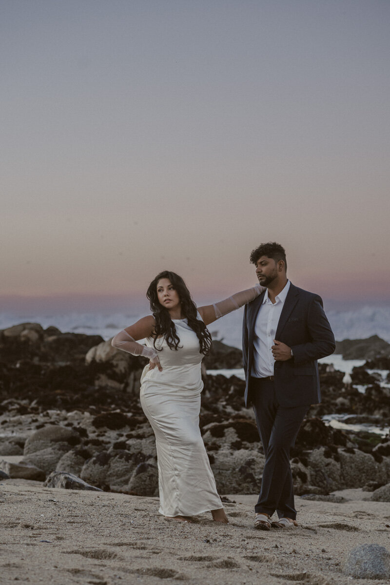 bride and groom eloping on the beach at sunrise in oahu hawaii