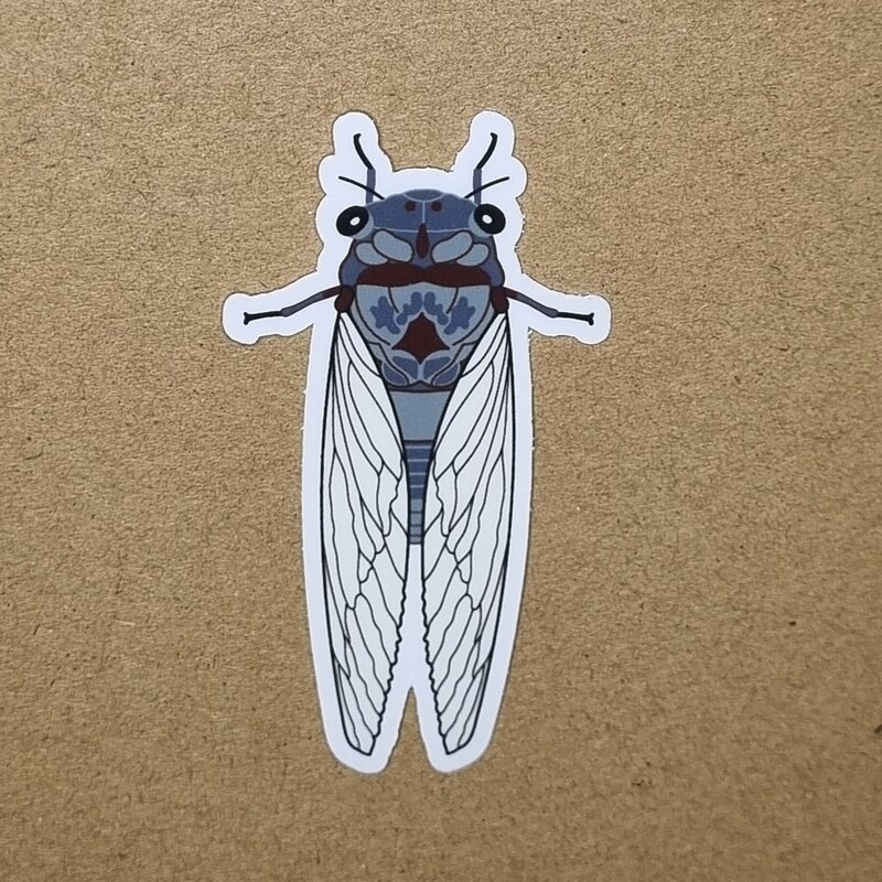 Celebrate the beauty of nature with this 75mm cicada sticker, featuring original artwork inspired by the intricate form of this iconic insect. Printed on durable, weatherproof vinyl and finished with a protective laminate, it’s designed to last—indoors or out. Perfect for decorating laptops, water bottles, notebooks, or outdoor gear, this sticker adds a touch of the wild wherever it's placed.