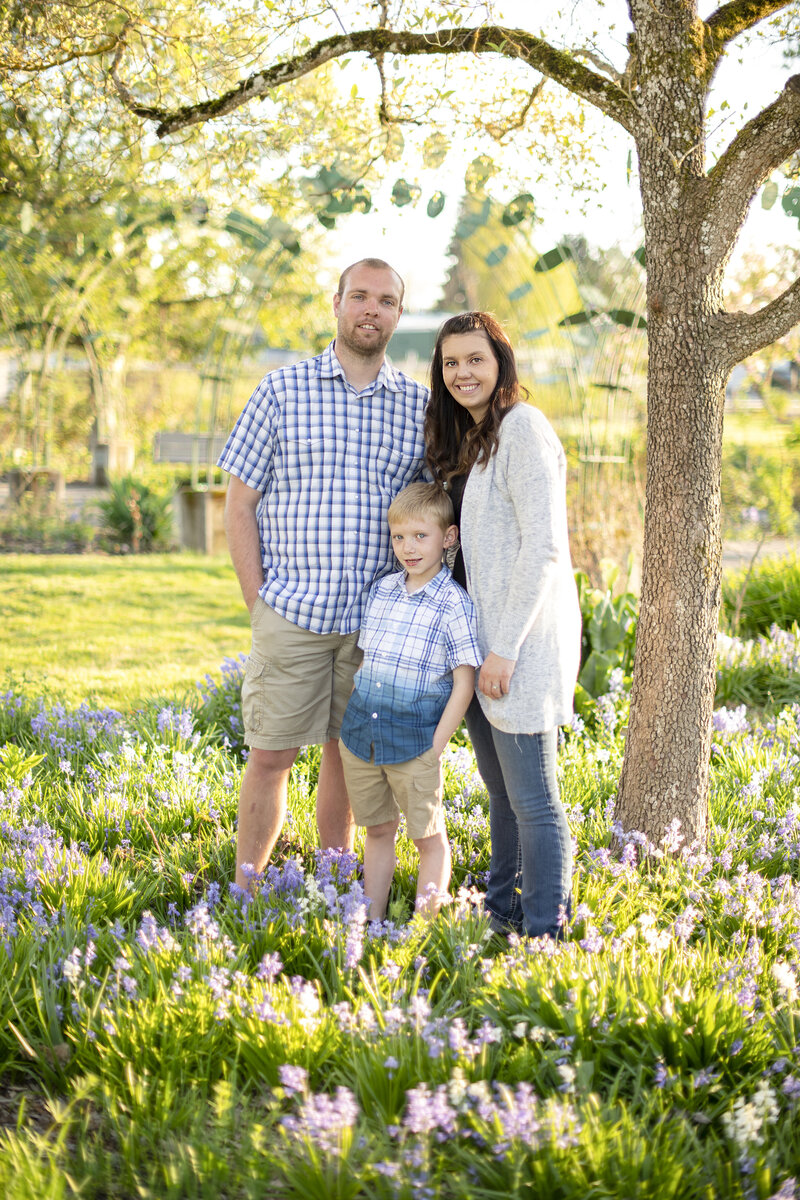 Family of 3 in the middle of the Rose Garden in Eugene  Oregon