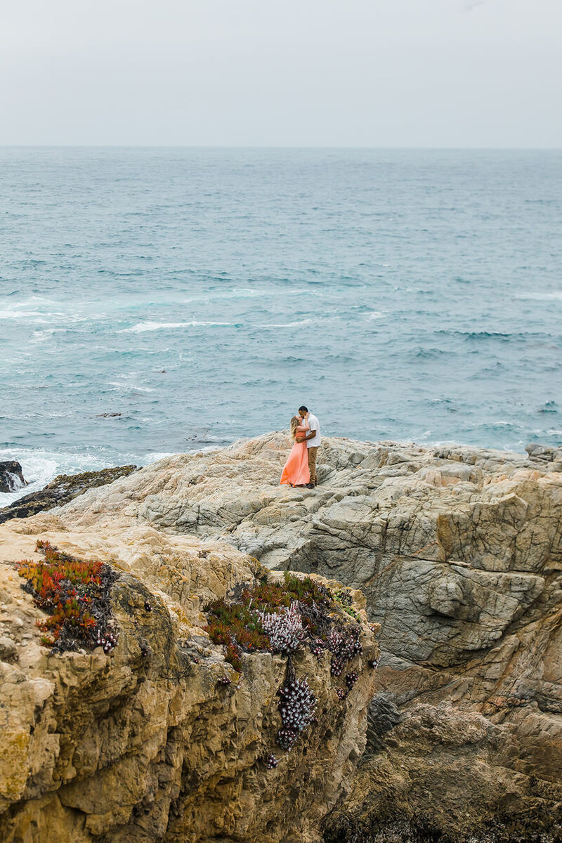 big sur engagement portraits on cliff