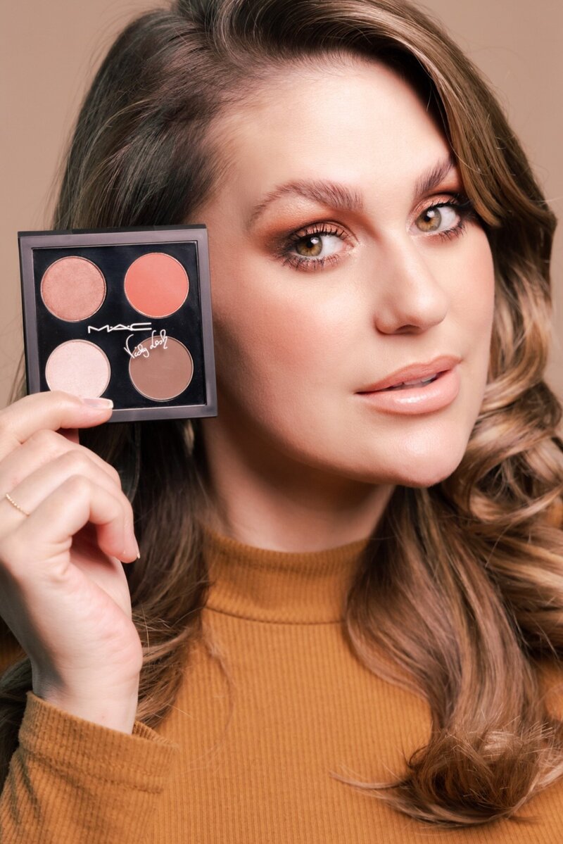 Commercial beauty campaign for MAC Cosmetics featuring influencer holding custom eyeshadow palette