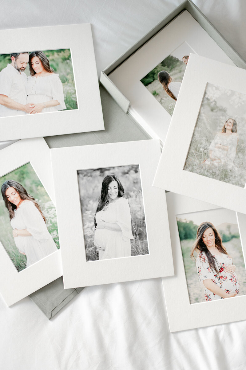 Matted prints of a pregnant mother in a field of wildflowers