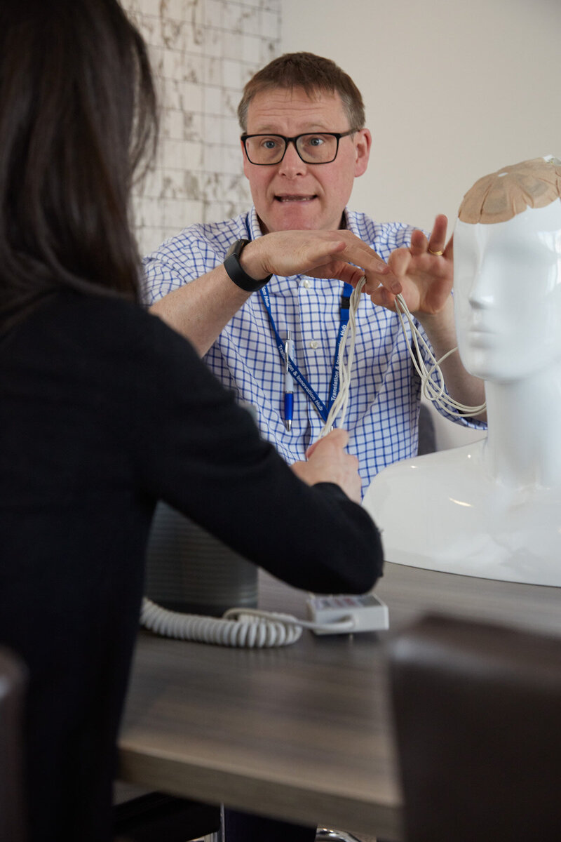 Image of Dr Williams talking to Lillie