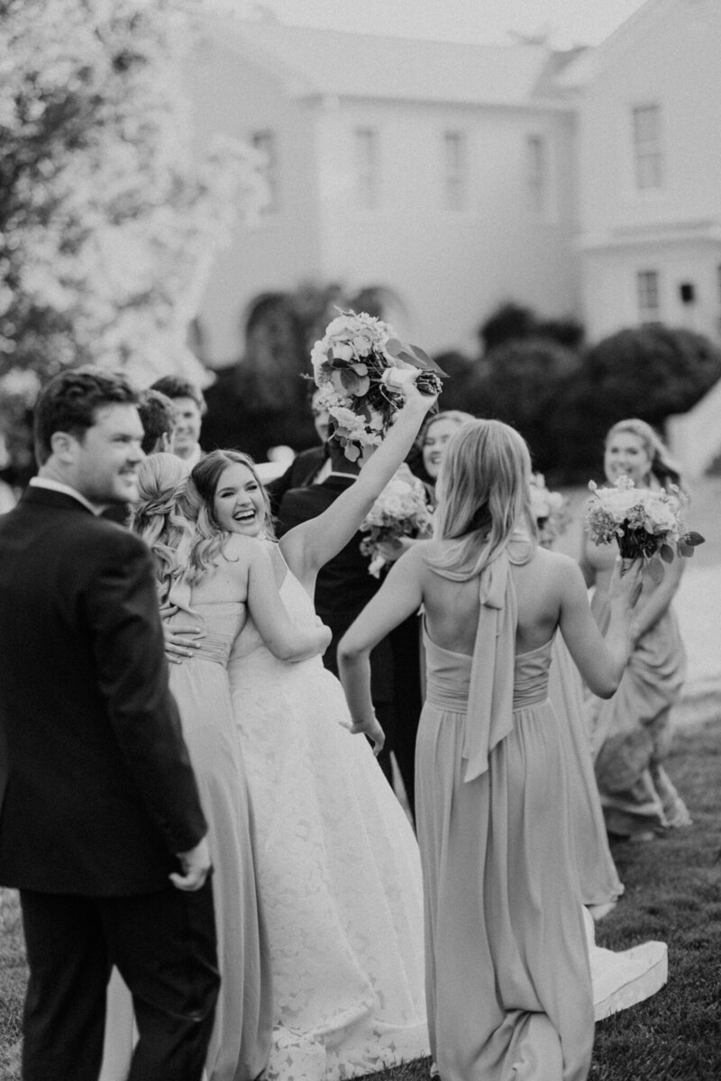 bridal party celebrating after a knoxville wedding photographer captures their ceremony
