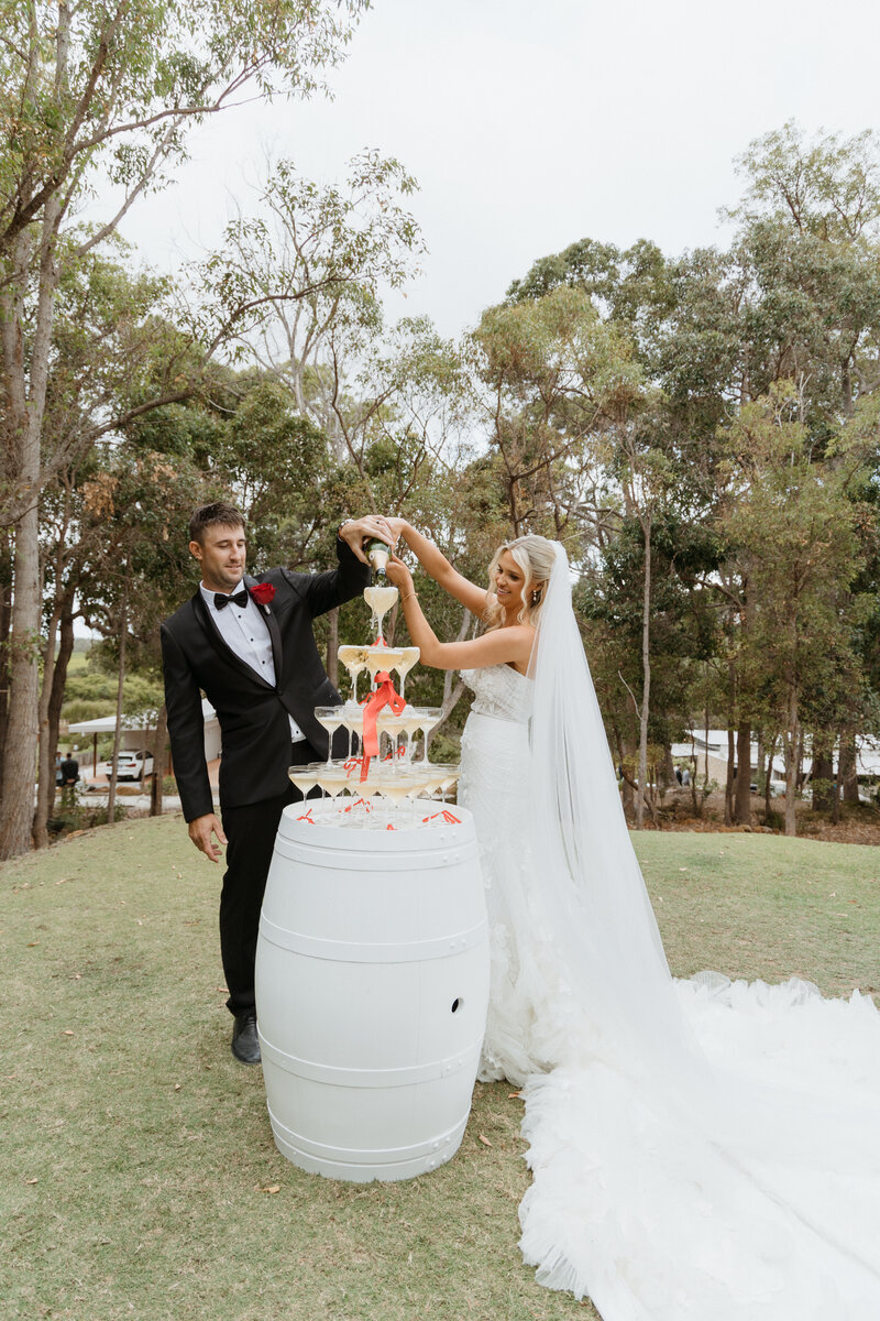 perth wedding photography couple champagne tower at Eight Willows Retreat