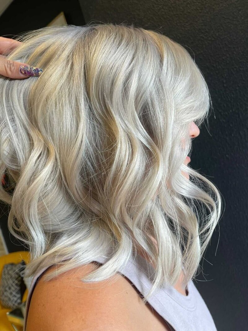 medium length platinum blonde hair with loose waves