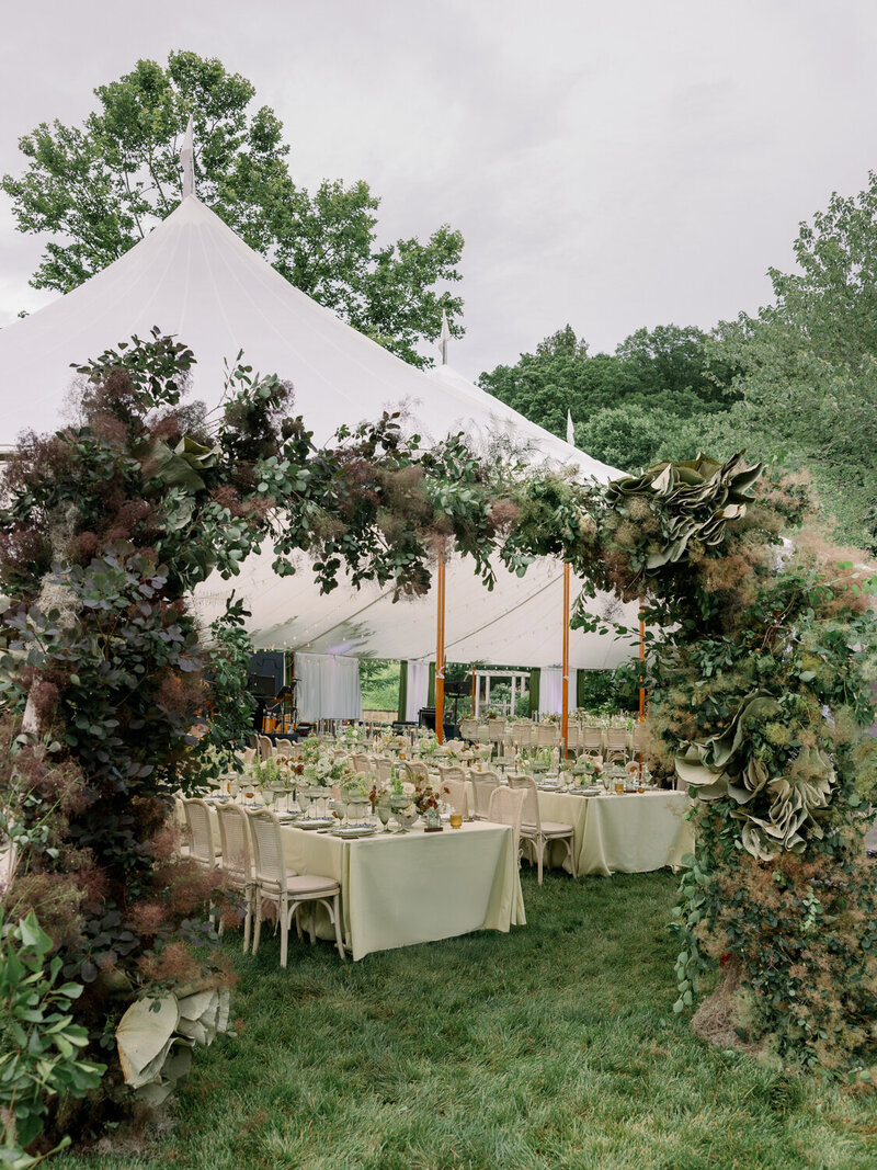 Pink and raspberry luxury Ginori china with yellow florals for a welcome dinner in Tuscany