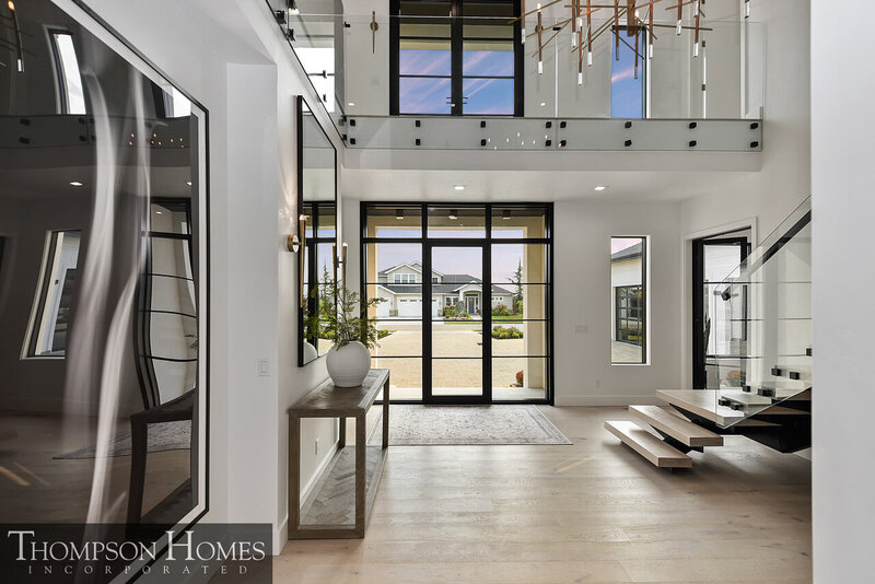 Grand foyer by Eagle Idaho luxury custom home builder and architect Thompson Homes