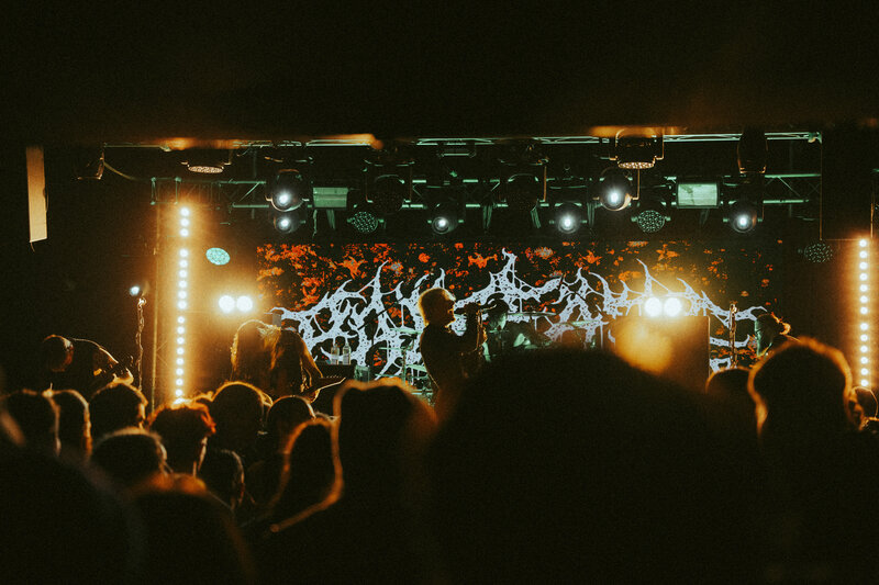Groomsmen walk in line to wedding