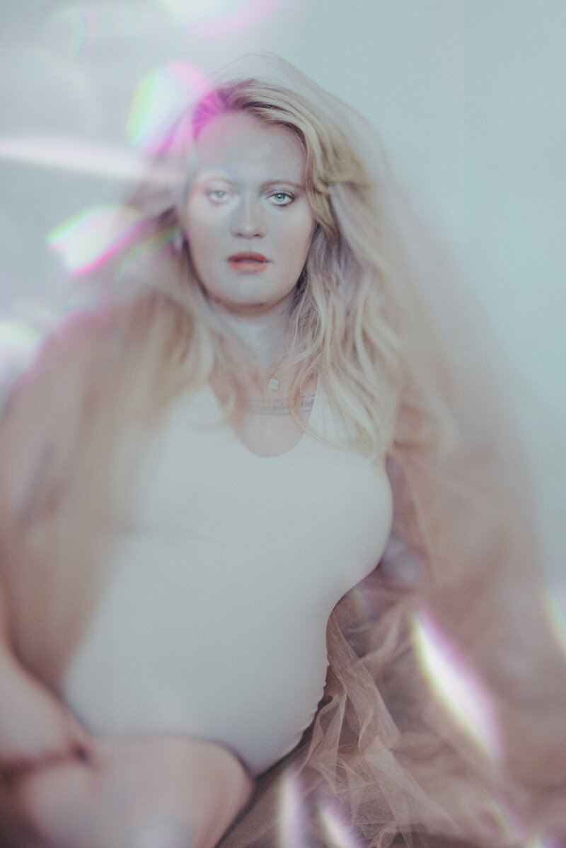 Luxury Photographer, and one of the Midwest's best in boudoir, weddings, portraits and family