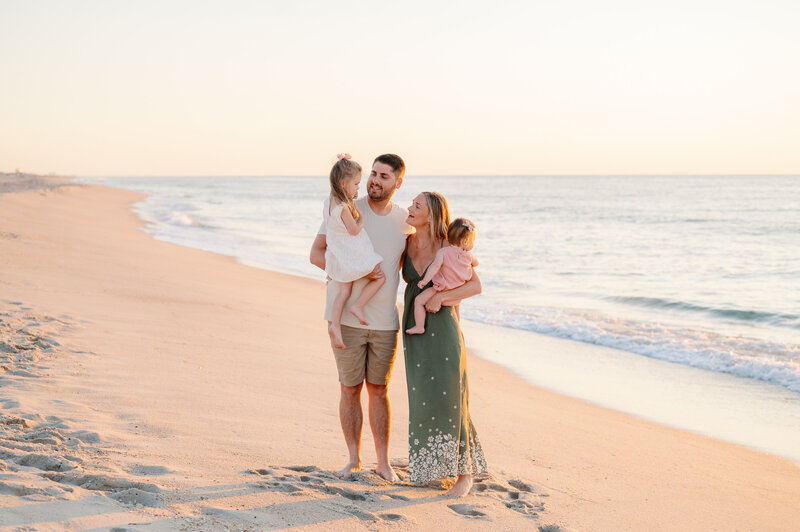 Family walking on beach