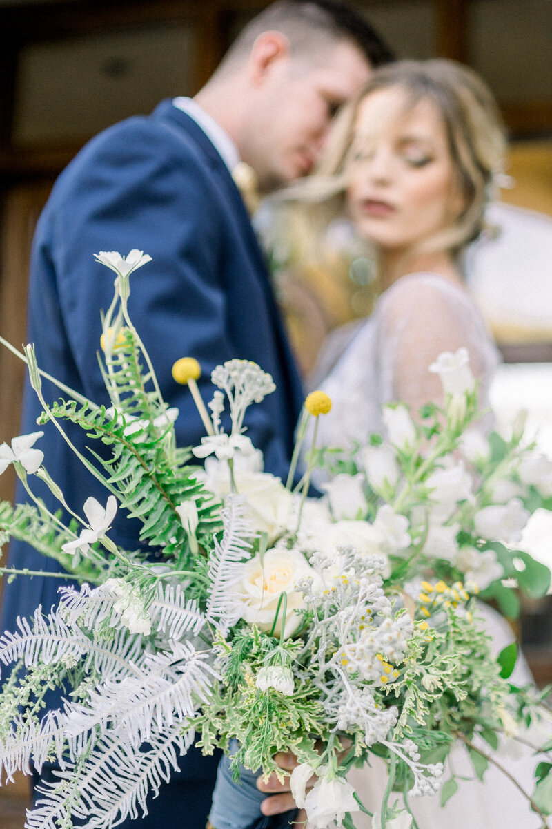 Tiffany Longeway Photography captures an intimate moment focusing on the elegant bridal bouquet at The Ritz-Carlton Bacara in Santa Barbara, California.