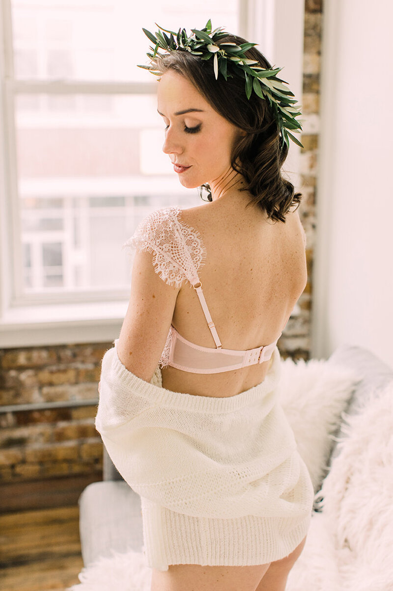 A floral crown was a whimsical, feminine accessory for this boudoir photoshoot.