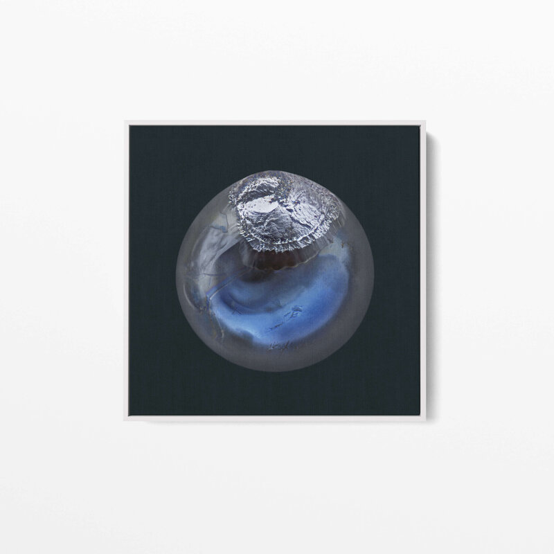 Fine Art Canvas with a white frame featuring Project Stardust micrometeorite NMM 2752 collected and photographed by Jon Larsen and Jan Braly Kihle