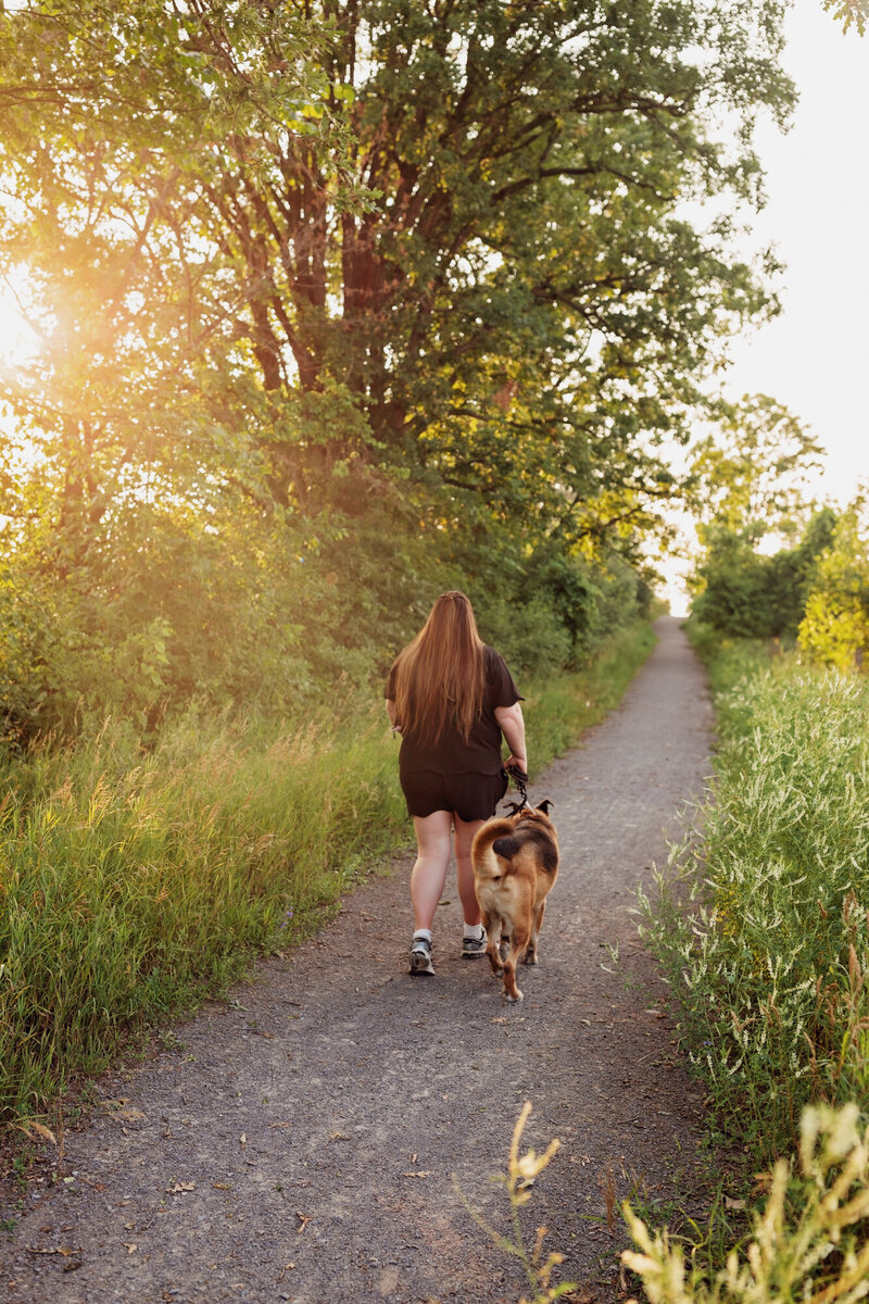 Claire, professional dog walker in Toronto and Hamilton, giving personalized pet care and walks for dogs of all sizes.