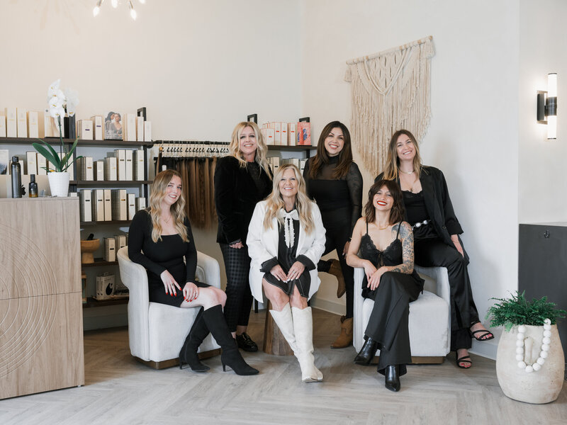team of female hair stylists in upscale hair salon