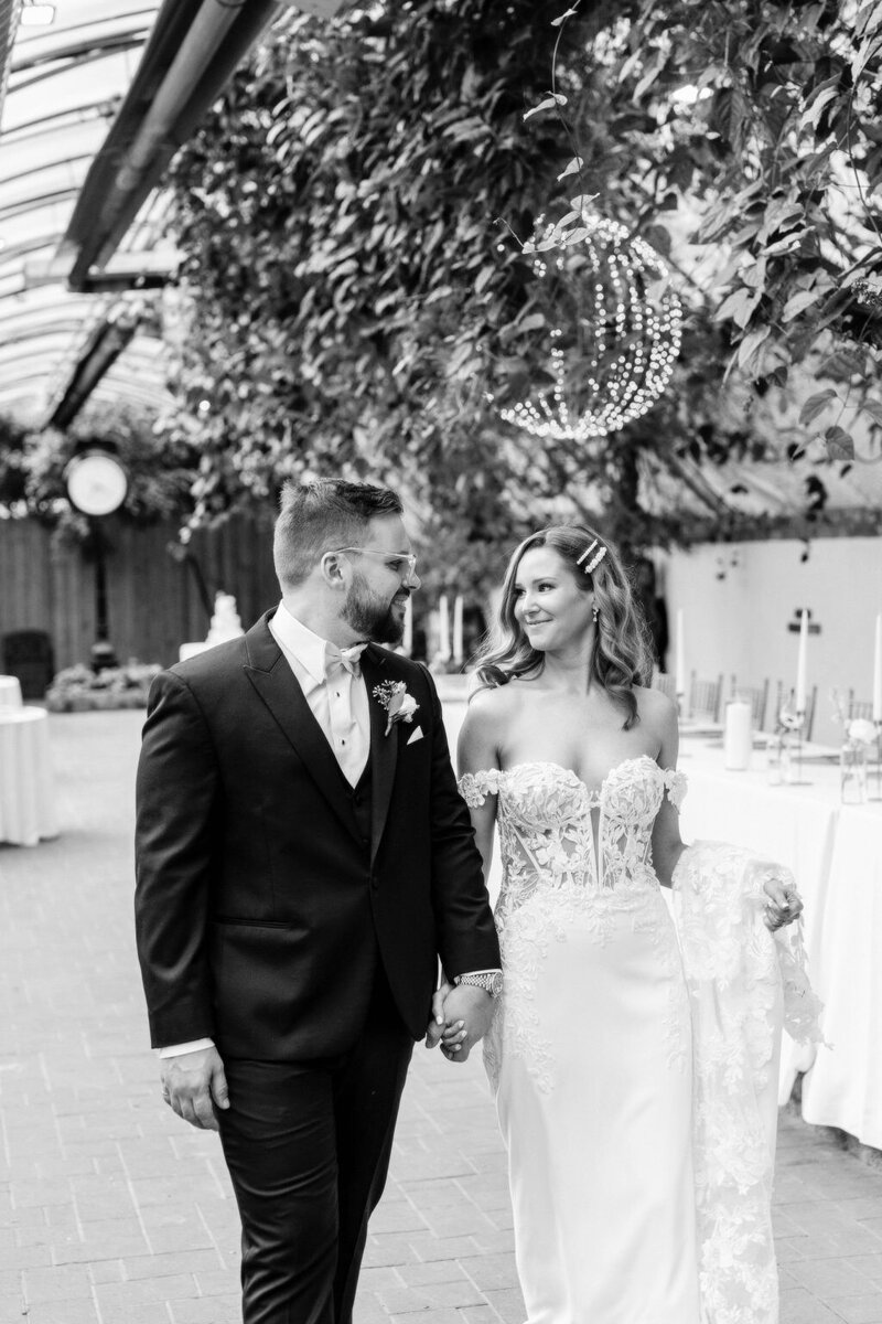 bride and groom wedding portraits in black and white  at Madison Greenhouse