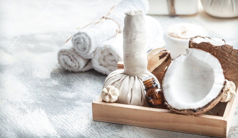 spa-still-life-with-fresh-coconut-body-care-products