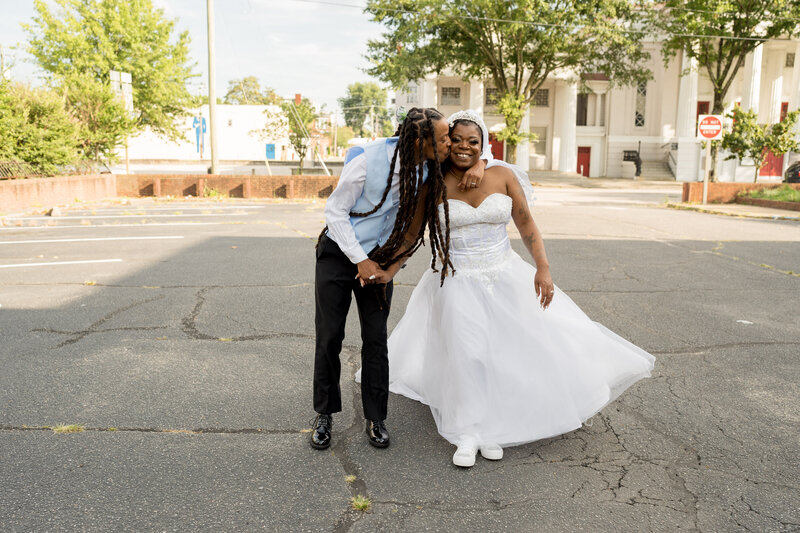 Bride and Groom kissing and walking after their wedding elopement in Richmond, Va.