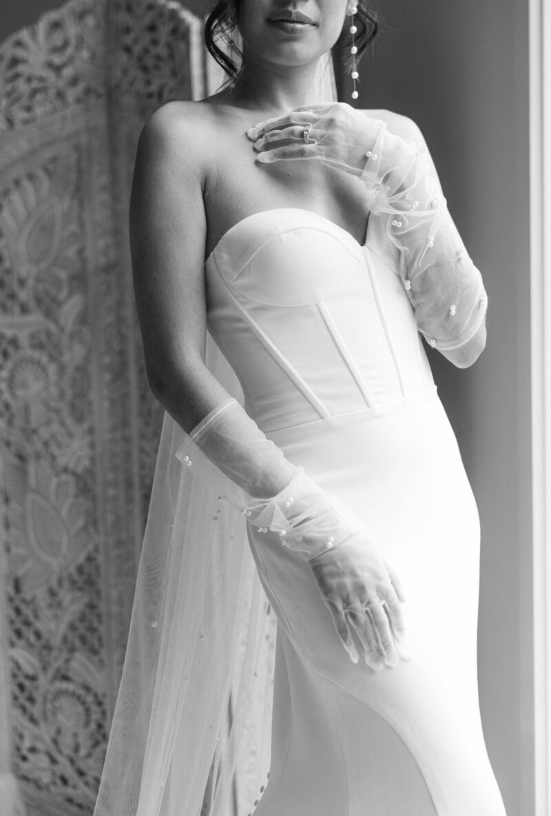 a bride posing in her wedding dress